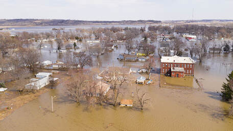 Picture of a flooded town that is underwater due to a natural disaster