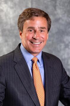 Professional business head shot picture of Roger Zacharia