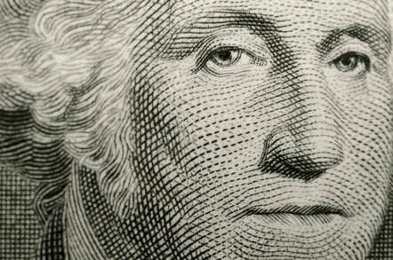 Close-up picture of President George Washington's face on a US one dollar bill