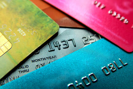 Close up picture of a pile of credit cards